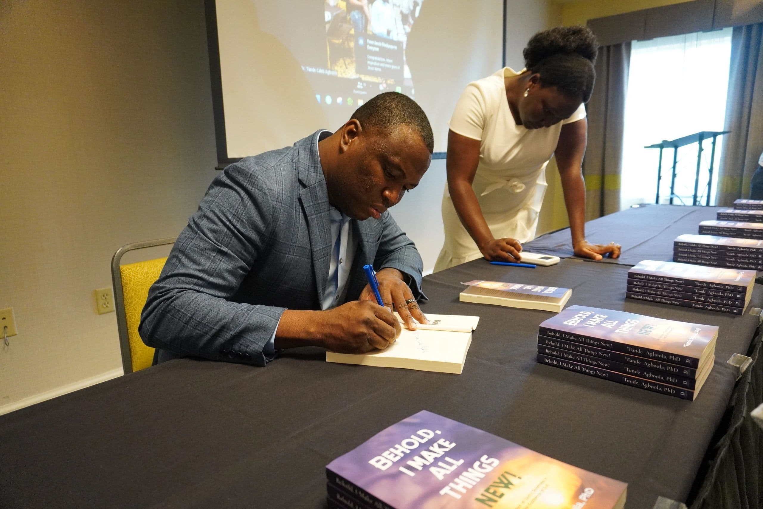 Book signing at the launch